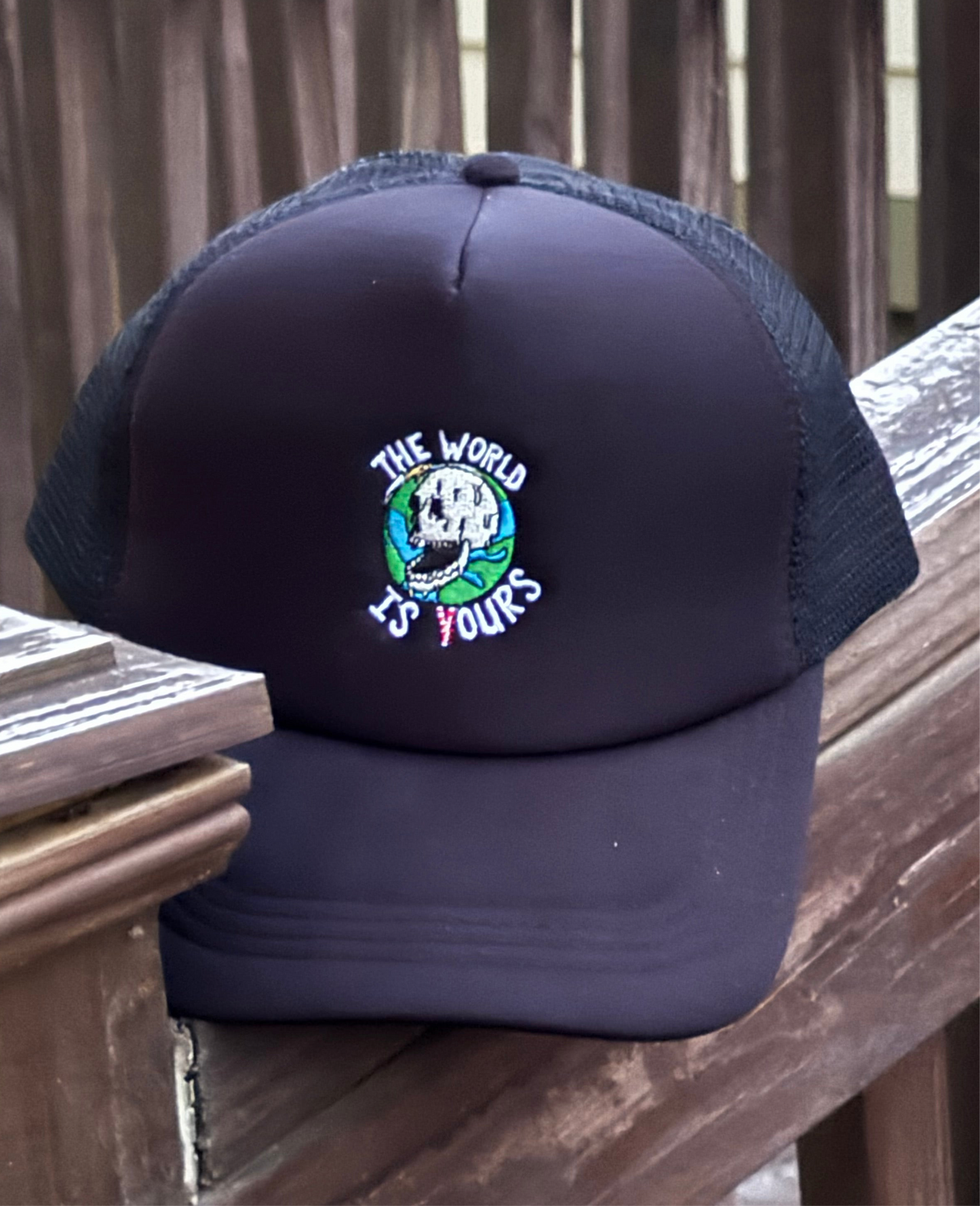 The World Is Ours Black Trucker Hat